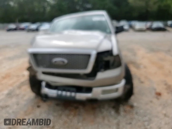 2004 Ford F-150 XLT with VIN 1FTPW14534KA52354, listed as a Copart auction lot 51713855 with 148,707 mi miles and Salvage title. Bid and sale history available at DreamBid. Image 11.