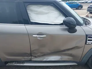 2018 MINI Countryman Cooper z VIN WMZYV5C39J3E02982, wystawiony jako IAAI lot #42384795 z przebiegiem 74 599 mil mil oraz . Historia ofert i sprzedaży dostępna na DreamBid. Obrazek 6.