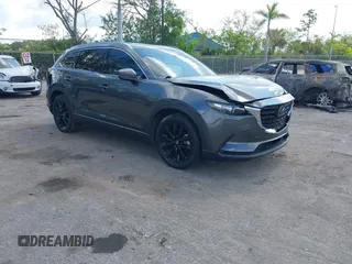 2022 Mazda CX-9 Touring Plus with VIN JM3TCBAY9N0624575, listed as a IAAI auction lot 42326284 with 16,572 mi miles and . Bid and sale history available at DreamBid. Image 1.