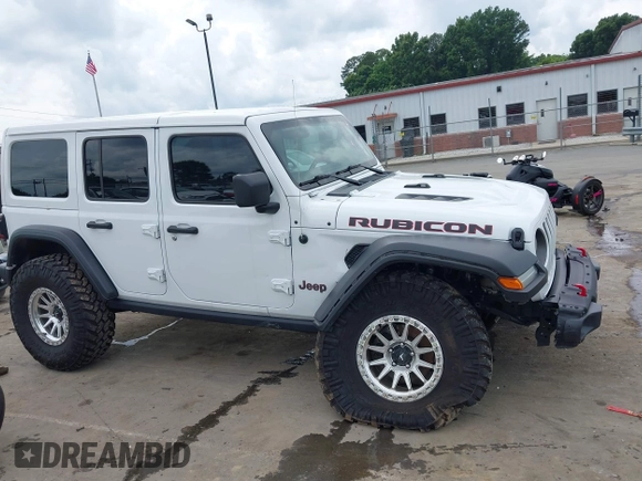 2021 Jeep Wrangler Unlimited Rubicon with VIN 1C4HJXFG7MW527498, listed as a IAAI auction lot 42393520 with 18,085 mi miles and . Bid and sale history available at DreamBid. Image 13.