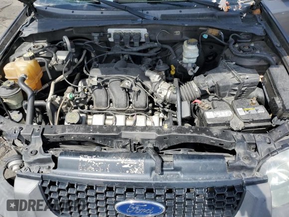 2006 Ford Escape XLT z VIN 1FMCU03186KA78489, wystawiony jako Copart lot #55412325 z przebiegiem 144 243 mil mil oraz Szkoda całkowita • Salvage title. Historia ofert i sprzedaży dostępna na DreamBid. Obrazek 12.