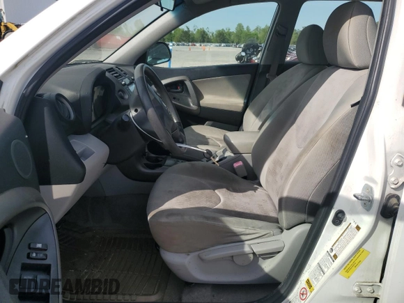 2009 Toyota RAV4 with VIN JTMBF33V49D002677, listed as a Copart auction lot 53811525 with 214,147 mi miles and Salvage Title. Bid and sale history available at DreamBid. Image 7.