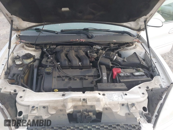 2003 Ford Taurus SE z VIN 1FAFP58S63A158422, wystawiony jako IAAI lot #41933813 z przebiegiem 71 990 mil mil oraz . Historia ofert i sprzedaży dostępna na DreamBid. Obrazek 10.