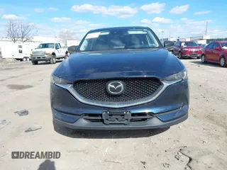 2020 Mazda CX-5 Grand Touring with VIN JM3KFBDM2L0768770, listed as a IAAI auction lot 41695058 with 44,192 mi miles. Bid and sale history available at carsss.com. Image 11.