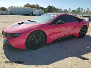 2015 BMW i8 with VIN WBY2Z2C5XFV674362, listed as a Copart auction lot 77100464 with 67,061 mi miles and Clean Title. Bid and sale history available at carsss.com. Image 1.