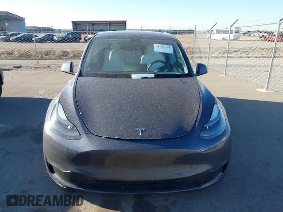 2023 Tesla Model Y Long Range with VIN 7SAYGAEEXPF714760, listed as a IAAI auction lot 41748398 with 49,802 mi miles and . Bid and sale history available at DreamBid. Image 13.