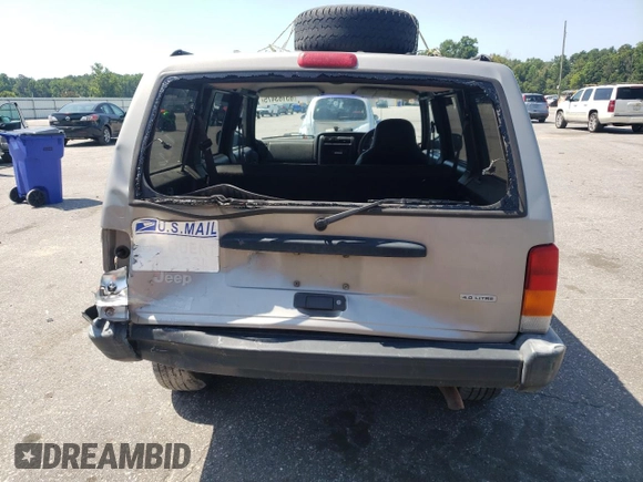 2000 Jeep Cherokee with VIN 1J4FN28S6YL210944, listed as a Copart auction lot 65163475 with 147,609 mi miles and Salvage title. Bid and sale history available at DreamBid. Image 6.