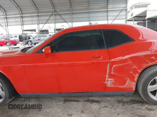 2009 Dodge Challenger R/T z VIN 2B3LJ54TX9H558332, wystawiony jako IAAI lot #42118072 z przebiegiem 173 010 mil mil oraz . Historia ofert i sprzedaży dostępna na DreamBid. Obrazek 15.