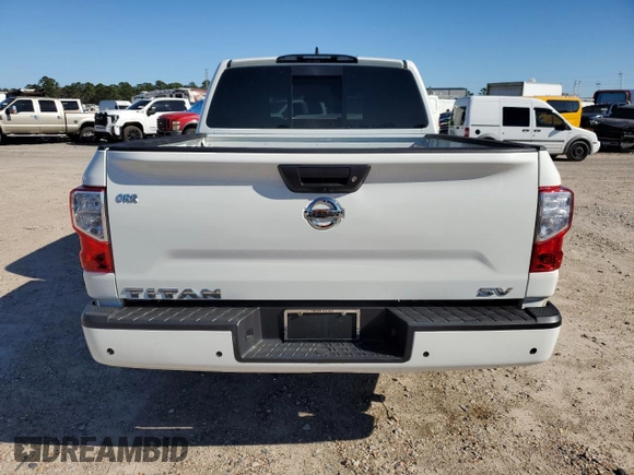 2022 Nissan Titan SV with VIN 1N6AA1EE7NN104391, listed as a Copart auction lot 87625165 with 51,341 mi miles and Salvage title. Bid and sale history available at DreamBid. Image 6.