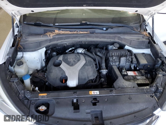 2013 Hyundai Santa Fe Sport z VIN 5XYZUDLAXDG118080, wystawiony jako Copart lot #54294665 z przebiegiem 142 809 mil mil oraz Szkoda całkowita • Salvage title. Historia ofert i sprzedaży dostępna na DreamBid. Obrazek 12.