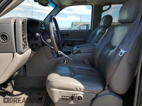2004 Chevrolet Suburban LT with VIN 3GNFK16T24G168520, listed as a Copart auction lot 64969795 with 215,145 mi miles and Salvage title. Bid and sale history available at DreamBid. Image 7.