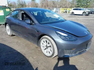 2022 Tesla Model 3 Long Range with VIN 5YJ3E1EB0NF365284, listed as a IAAI auction lot 41899706 with 36,463 mi miles and . Bid and sale history available at DreamBid. Image 1.