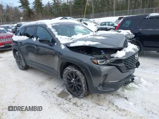 2023 Mazda CX-50 S Preferred Plus z VIN 7MMVABCMXPN129843, wystawiony jako IAAI lot #41380185 z przebiegiem 14 269 mil mil oraz . Historia ofert i sprzedaży dostępna na DreamBid. Obrazek 1.