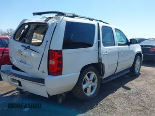 2013 Chevrolet Tahoe LTZ with VIN 1GNSKCE08DR161606, listed as a IAAI auction lot 41984912 with 189,181 mi miles and . Bid and sale history available at DreamBid. Image 4.