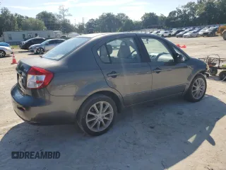 2011 Suzuki SX4 LE with VIN JS2YC5A27B6304410, listed as a Copart auction lot 72119824 with 118,357 mi miles and Salvage Title. Bid and sale history available at carsss.com. Image 3.