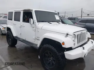 2016 Jeep Wrangler Unlimited Sahara with VIN 1C4HJWEG8GL240950, listed as a IAAI auction lot 41443059 with Not provided miles and . Bid and sale history available at DreamBid. Image 1.