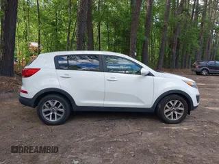 2016 Kia Sportage LX with VIN KNDPB3AC7G7819625, listed as a IAAI auction lot 42214385 with 141,339 mi miles. Bid and sale history available at carsss.com. Image 13.