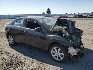 2011 Mazda 3 i Touring with VIN JM1BL1VF8B1408889, listed as a Copart auction lot 63798045 with 84,912 mi miles and Salvage title. Bid and sale history available at DreamBid. Image 4.
