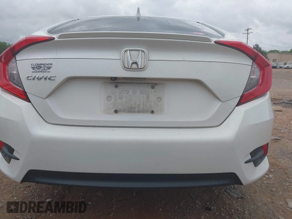 2017 Honda Civic EX-L with VIN 2HGFC1F72HH658763, listed as a IAAI auction lot 41972317 with 166,168 mi miles and . Bid and sale history available at DreamBid. Image 17.