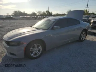 2021 Dodge Charger SXT with VIN 2C3CDXBG6MH518284, listed as a Copart auction lot 50682295 with 89,674 mi miles and Salvage Title. Bid and sale history available at carsss.com. Image 1.