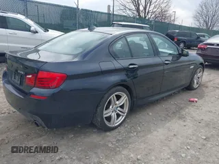 2013 BMW 5 Series 535i xDrive with VIN WBAFU7C51DDU75974, listed as a IAAI auction lot 41837789 with 216,394 mi miles and . Bid and sale history available at carsss.com. Image 4.