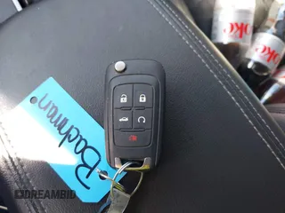 2014 Buick LaCrosse Leather with VIN 1G4GB5G35EF187094, listed as a IAAI auction lot 41663337 with 135,179 mi miles. Bid and sale history available at carsss.com. Image 11.