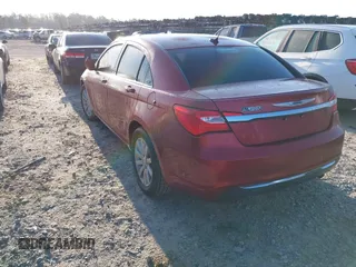 2014 Chrysler 200 Touring with VIN 1C3CCBBB2EN177002, listed as a IAAI auction lot 41862778 with 81,052 mi miles and . Bid and sale history available at DreamBid. Image 3.