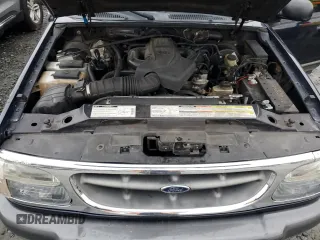 1999 Ford Explorer XLT z VIN 1FMZU32E6XZB83945, wystawiony jako Copart lot #85654724 z przebiegiem 308 924 mil mil oraz Szkoda całkowita • Salvage title. Historia ofert i sprzedaży dostępna na DreamBid. Obrazek 12.