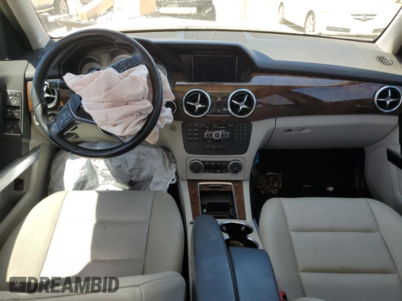 2015 Mercedes-Benz GLK 250 with VIN WDCGG0EB2FG402004, listed as a Copart auction lot 63126493 with 130,821 mi miles and . Bid and sale history available at DreamBid. Image 8.