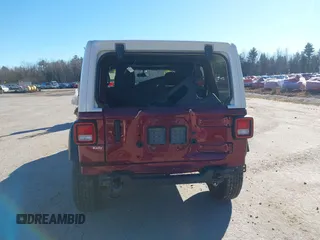 2021 Jeep Wrangler Unlimited Sport S z VIN 1C4HJXDG4MW647164, wystawiony jako IAAI lot #40952672 z przebiegiem 51 366 mil mil oraz . Historia ofert i sprzedaży dostępna na DreamBid. Obrazek 17.