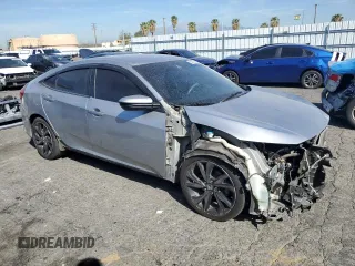 2019 Honda Civic Sport with VIN 2HGFC2F85KH502724, listed as a Copart auction lot 53750895 with 112,750 mi miles and Salvage Title. Bid and sale history available at DreamBid. Image 4.