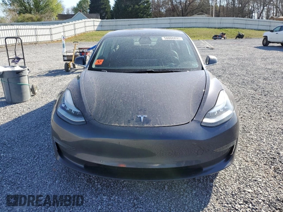 2019 Tesla Model 3 Mid Range with VIN 5YJ3E1EA5KF412702, listed as a Copart auction lot 50008895 with 134,178 mi miles and Salvage Title. Bid and sale history available at carsss.com. Image 5.