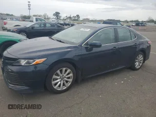 2018 Toyota Camry LE с VIN 4T1B11HK7JU643274, выставлен на аукционе Copart как лот 57064245 с пробегом 162 857 миль миль и Чистый • Clean title. История ставок и продаж доступна на DreamBid. Изображение 1.