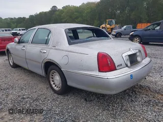 2001 Lincoln Town Car Executive with VIN 1LNHM81W91Y684733, listed as a IAAI auction lot 41949151 with 136,356 mi miles and . Bid and sale history available at DreamBid. Image 3.