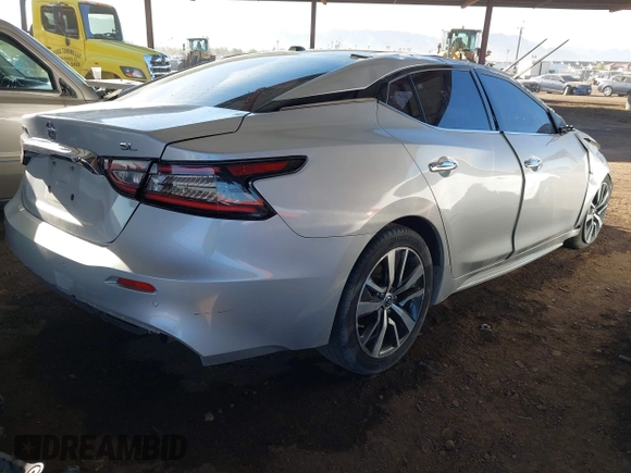 2019 Nissan Maxima Platinum z VIN 1N4AA6AV6KC363764, wystawiony jako IAAI lot #41506203 z przebiegiem 92 415 mil mil oraz . Historia ofert i sprzedaży dostępna na DreamBid. Obrazek 4.