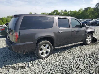 2010 Chevrolet Suburban LT with VIN 1GNUCJE03AR196074, listed as a Copart auction lot 53870425 with 265,793 mi miles and Salvage Title. Bid and sale history available at DreamBid. Image 3.