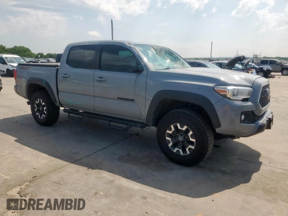 2019 Toyota Tacoma SR z VIN 5TFCZ5AN6KX211952, wystawiony jako Copart lot #58964815 z przebiegiem 97 774 mil mil oraz Szkoda całkowita • Salvage title. Historia ofert i sprzedaży dostępna na DreamBid. Obrazek 4.