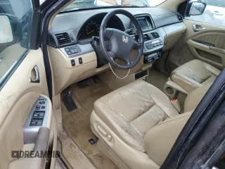 2009 Honda Odyssey EX-L z VIN 5FNRL38799B058592, wystawiony jako Copart lot #58528595 z przebiegiem 150 764 mil mil oraz Czysty tytuł • Clean title. Historia ofert i sprzedaży dostępna na DreamBid. Obrazek 8.