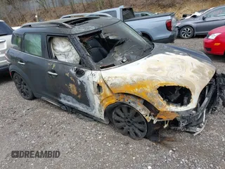 2019 MINI Countryman Cooper S z VIN WMZYT5C59K3E64682, wystawiony jako IAAI lot #42149889 z przebiegiem Nie podano mil oraz . Historia ofert i sprzedaży dostępna na DreamBid. Obrazek 1.