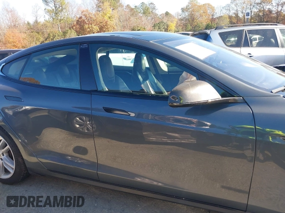 2013 Tesla Model S Performance with VIN 5YJSA1DP7DFP11737, listed as a IAAI auction lot 40915195 with Not provided miles and . Bid and sale history available at DreamBid. Image 12.