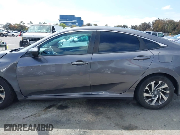 2016 Honda Civic Sedan EX with VIN 2HGFC2F7XGH526418, listed as a IAAI auction lot 41890264 with 124,620 mi miles. Bid and sale history available at carsss.com. Image 14.