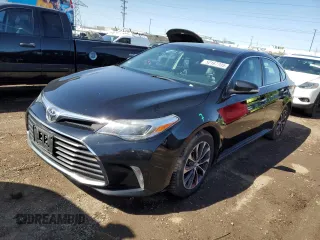 2016 Toyota Avalon Limited with VIN 4T1BK1EB2GU210276, listed as a Copart auction lot 52167705 with 148,137 mi miles and Salvage Title. Bid and sale history available at carsss.com. Image 1.