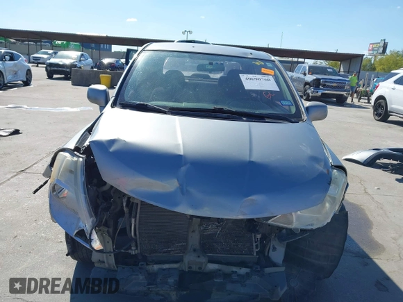2010 Nissan Versa S with VIN 3N1BC1AP2AL394996, listed as a IAAI auction lot 40690760 with 125,972 mi miles and . Bid and sale history available at DreamBid. Image 6.