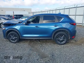 2020 Mazda CX-5 Touring with VIN JM3KFACM0L0775020, listed as a IAAI auction lot 40876970 with 96,424 mi miles. Bid and sale history available at carsss.com. Image 13.