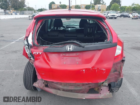 2015 Honda Fit LX with VIN 3HGGK5H5XFM775385, listed as a IAAI auction lot 42555319 with 81,615 mi miles and . Bid and sale history available at DreamBid. Image 18.
