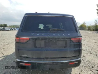 2023 Jeep Wagoneer z VIN 1C4SJVAT1PS514577, wystawiony jako Copart lot #73935334 z przebiegiem 34 250 mil mil oraz Nie do naprawy • Non repairable. Historia ofert i sprzedaży dostępna na DreamBid. Obrazek 6.