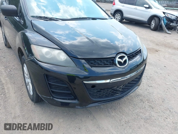 2011 Mazda CX-7 i Sport z VIN JM3ER2B54B0389008, wystawiony jako IAAI lot #42425348 z przebiegiem 215 742 mil mil oraz . Historia ofert i sprzedaży dostępna na DreamBid. Obrazek 12.