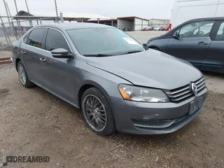 2013 Volkswagen Passat SE w/Sunroof with VIN 1VWBH7A30DC023976, listed as a IAAI auction lot 41392821 with 134,736 mi miles. Bid and sale history available at carsss.com. Image 1.