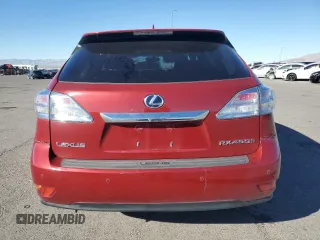 2010 Lexus RX 450h with VIN JTJZB1BA1A2002890, listed as a Copart auction lot 80060764 with 106,880 mi miles and Salvage Title. Bid and sale history available at DreamBid. Image 6.