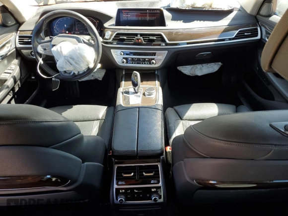 2020 BMW 7 Series 740i with VIN WBA7T2C07LCD79725, listed as a Copart auction lot 48498255 with 57,580 mi miles and Salvage title. Bid and sale history available at DreamBid. Image 8.